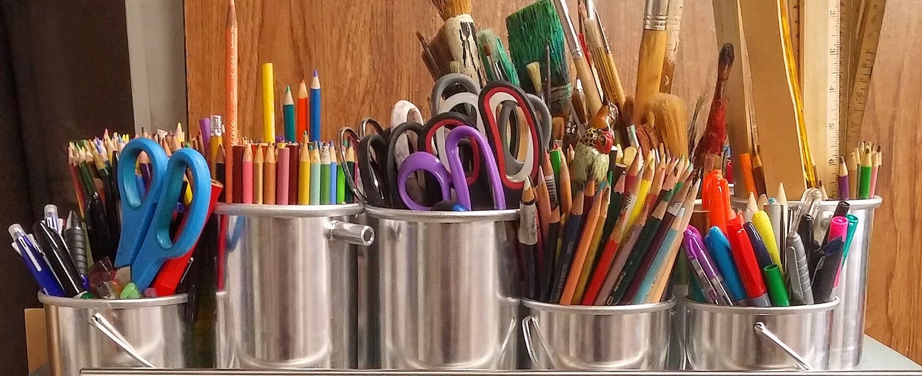 pencils in stainless steel bucket